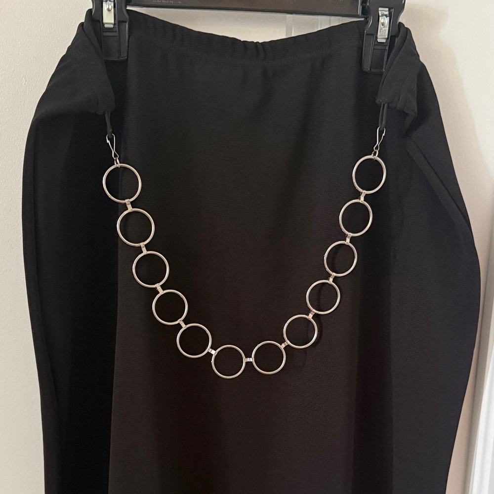 Sophisticated Black Pencil Skirt with Silver Ring Accent